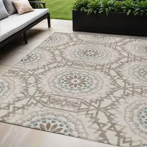 Photo of Beige Brown And Teal Blue Floral Medallion Washable Indoor Outdoor Area Rug