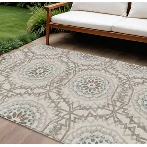 Photo of Beige Brown And Teal Blue Floral Medallion Washable Indoor Outdoor Area Rug