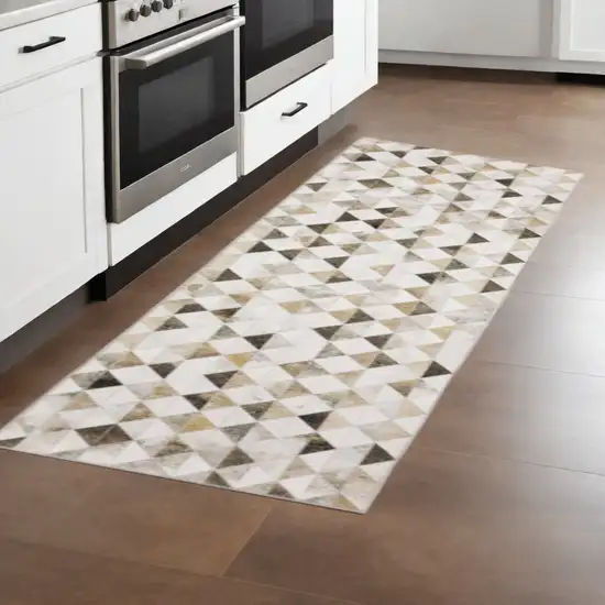 8' Beige and Ivory Geometric Power Loom Runner Rug Photo 1