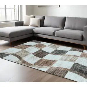 Photo of Beige Brown and Gray Checkered Area Rug