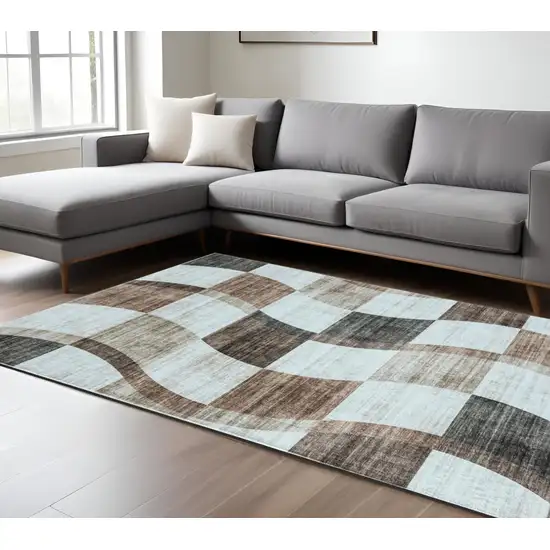 Beige Brown and Gray Checkered Area Rug Photo 1