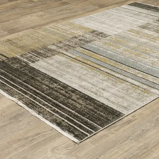 Beige Charcoal Brown Grey Tan Gold And Blue Geometric Power Loom Stain Resistant Area Rug With Fringe Photo 5