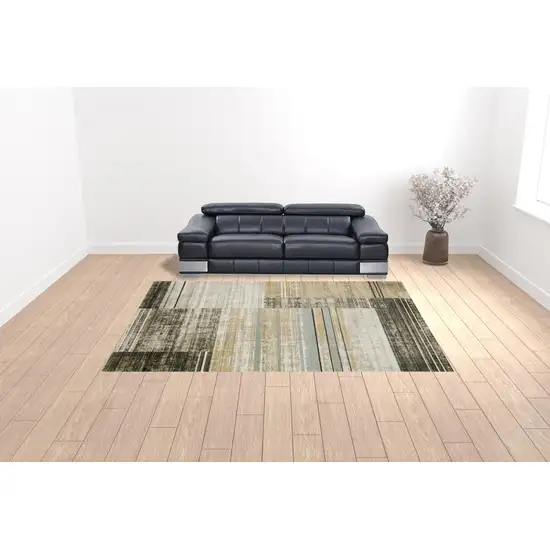 Beige Charcoal Brown Grey Tan Gold And Blue Geometric Power Loom Stain Resistant Area Rug With Fringe Photo 2