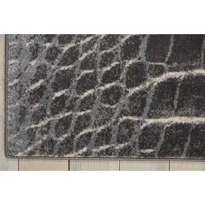 Photo of Beige Charcoal and Cream Animal Print Distressed Non Skid Area Rug