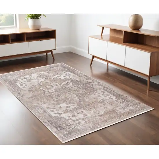 Beige and Ivory Medallion Power Loom Area Rug Photo 1