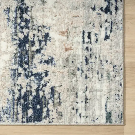 Beige Cream Blue And Gray Abstract Stain Resistant Area Rug Photo 1