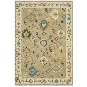 Photo of Beige Dark Orange And Blue Oriental Area Rug With Fringe