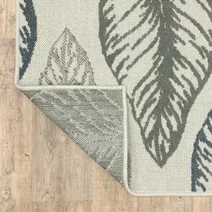 Photo of Beige Floral Stain Resistant Indoor Outdoor Area Rug