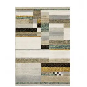 Photo of Beige Gold Black Grey Tan Teal And Rust Geometric Power Loom Area Rug