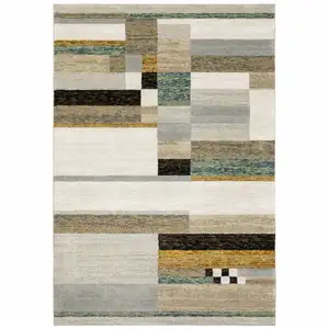 Photo of Beige Gold Black Grey Tan Teal And Rust Geometric Power Loom Area Rug