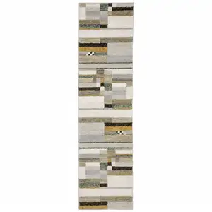 Photo of Beige Gold Black Grey Tan Teal And Rust Geometric Power Loom Stain Resistant Runner Rug