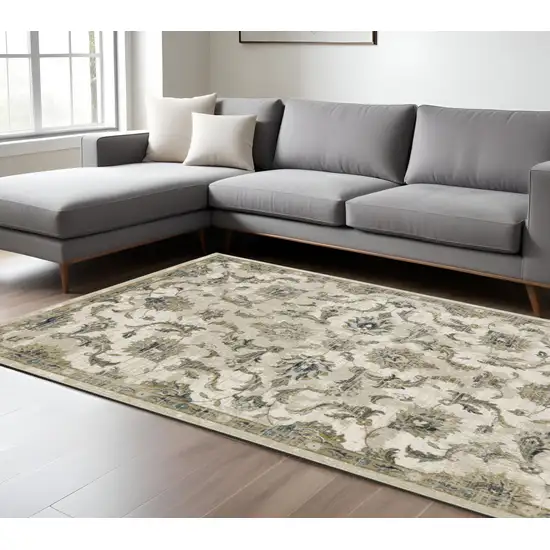 8' X 10' Beige Gold Blue And Grey Oriental Power Loom Stain Resistant Area Rug Photo 1