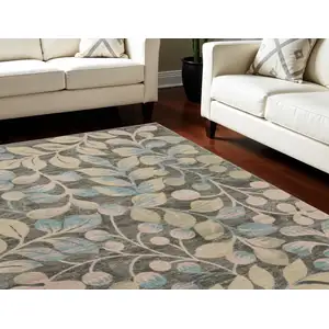 Photo of Beige Gray And Blue Botanical Leaves Area Rug