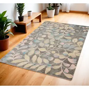 Photo of Beige Gray And Blue Botanical Leaves Area Rug