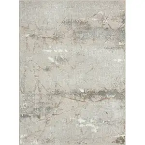 Photo of Beige Gray And Brown Abstract Stain Resistant Area Rug