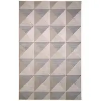 Photo of Beige Gray And Ivory Geometric Area Rug