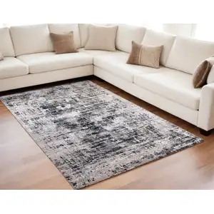 Photo of Beige Gray and White Abstract Area Rug