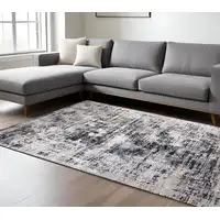 Photo of Beige Gray and White Abstract Area Rug