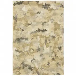 Photo of Beige Grey And Gold Abstract Power Loom Stain Resistant Area Rug