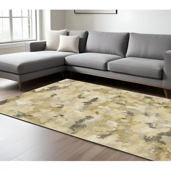 Beige and Ivory Abstract Power Loom Area Rug Photo 1