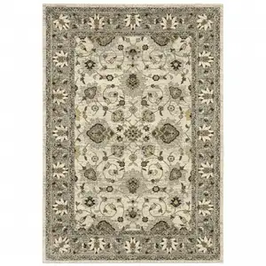 Photo of Beige Grey Brown And Charcoal Oriental Power Loom Stain Resistant Area Rug