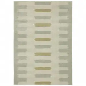 Photo of Beige Grey Gold And Green Geometric Power Loom Stain Resistant Area Rug