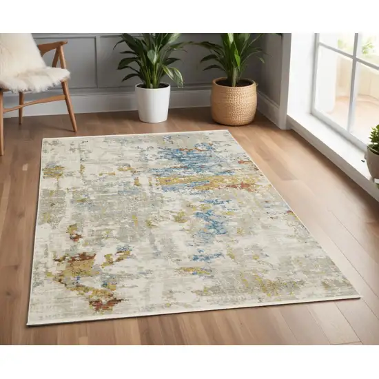 Beige Grey Gold Blue Rust And Teal Abstract Power Loom Stain Resistant Area Rug With Fringe Photo 1