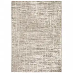 Photo of Beige Grey Ivory Tan And Brown Abstract Power Loom Stain Resistant Area Rug