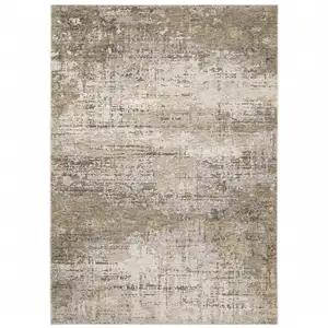 Photo of Beige Grey Ivory Tan And Brown Abstract Power Loom Stain Resistant Area Rug