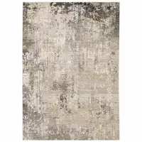 Photo of Beige Grey Ivory Tan And Brown Abstract Power Loom Stain Resistant Area Rug