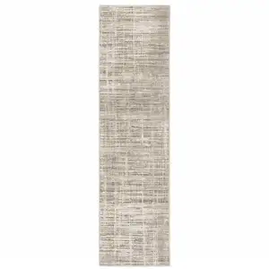 Photo of Beige Grey Ivory Tan And Brown Abstract Power Loom Stain Resistant Runner Rug