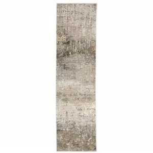 Photo of Beige Grey Ivory Tan And Brown Abstract Power Loom Stain Resistant Runner Rug