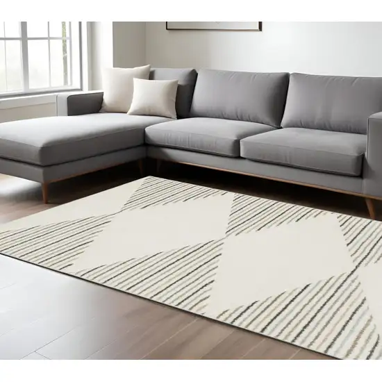 Beige and Black Geometric Power Loom Area Rug Photo 1