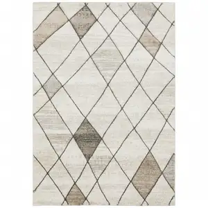 Photo of Beige Grey Tan And Brown Geometric Power Loom Stain Resistant Area Rug