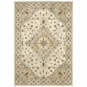 Photo of Beige Grey Tan And Brown Oriental Power Loom Stain Resistant Area Rug