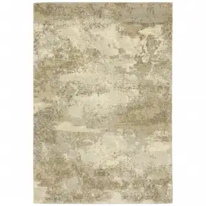 Photo of Beige Grey Tan And Gold Abstract Power Loom Stain Resistant Area Rug