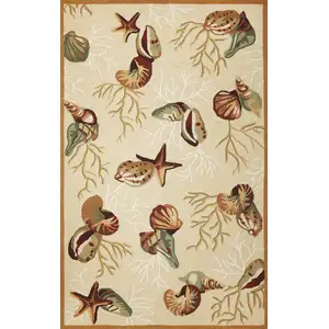 Photo of Beige Hand Hooked Sea Shells Indoor Accent Rug