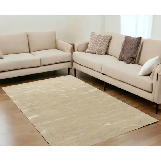 5'X7' Beige Hand Tufted Abstract Indoor Area Rug Photo 1