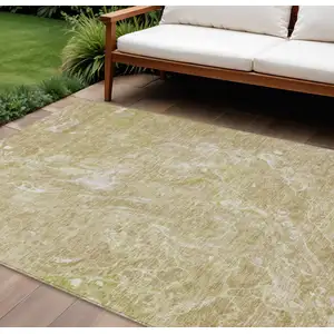 Photo of Beige Ivory And Artichoke Green Abstract Washable Indoor Outdoor Area Rug