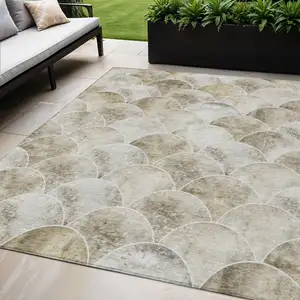 Photo of Beige Ivory And Tan Abstract Washable Indoor Outdoor Area Rug