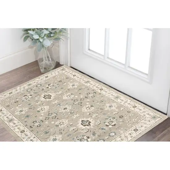 Beige and Ivory Oriental Power Loom Area Rug Photo 1