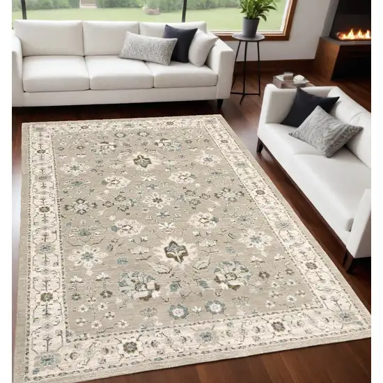 Beige and Ivory Oriental Power Loom Area Rug Photo 1