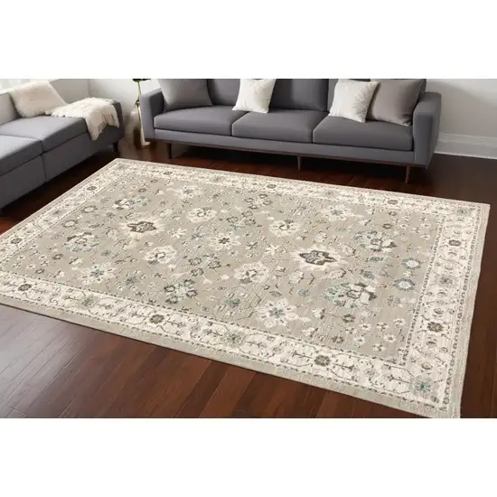 Beige and Ivory Oriental Power Loom Area Rug Photo 1