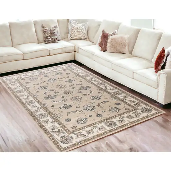 5'X8' Beige Ivory Bordered Floral Indoor Area Rug Photo 1