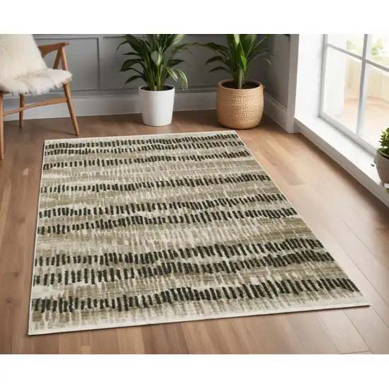 Beige Ivory Charcoal Brown Tan And Grey Abstract Power Loom Stain Resistant Area Rug With Fringe Photo 1