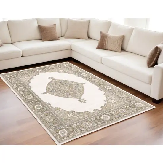 Beige and Ivory Oriental Power Loom Area Rug Photo 1