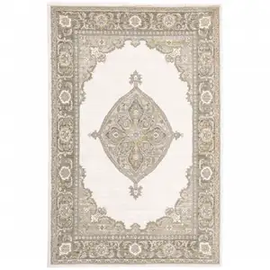 Photo of Beige Ivory Tan Gold Grey And Green Oriental Power Loom Stain Resistant Area Rug