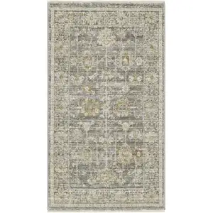 Photo of Beige Ivory and Gray Oriental Power Loom Distressed Area Rug With Fringe