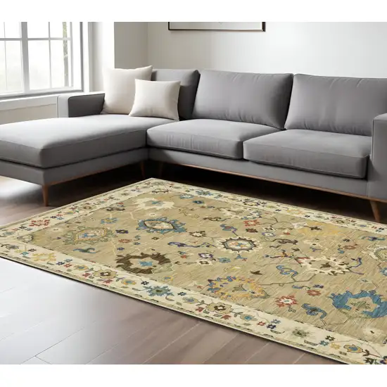 Beige Light Blue And Tan Oriental Area Rug With Fringe Photo 1