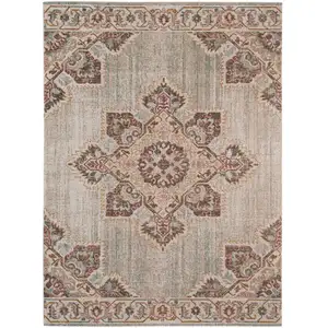 Photo of Beige Medallion Power Loom Area Rug With Fringe